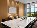 <p>A meeting room that can host various sizes and types of meetings</p>