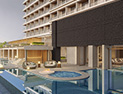 A poolside bar overlooking refreshing pine groves and beautiful beaches